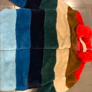 A faux fur colored coat